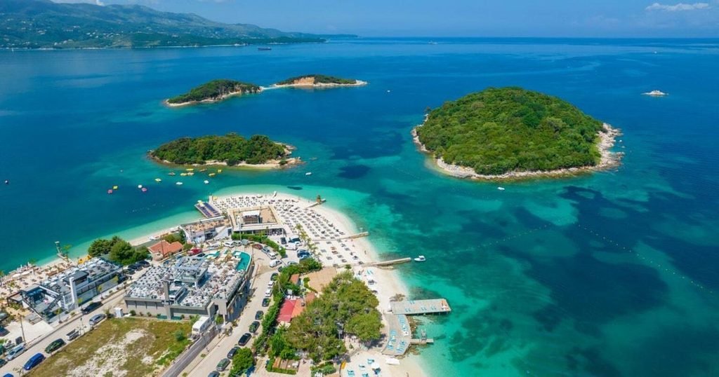 Ksamil beach on the Albanian Riviera with the Ionian Sea and Corfu in the distance