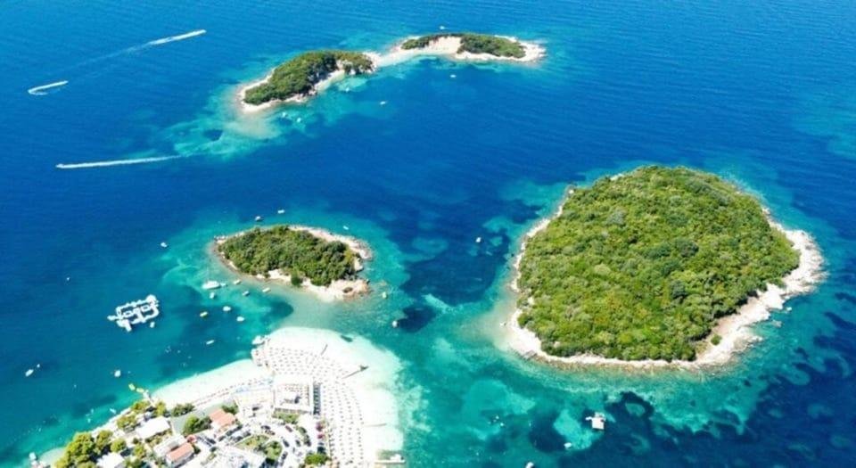 Coastal view of Ksamil in southern Albania overlooking the turquoise Ionian Sea and nearby islands